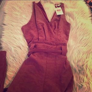 Super cute jumpsuit! New with tags.